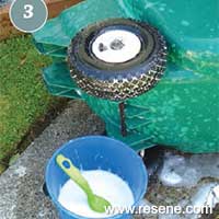 Step 3 how to convert a plastic wheel barrow into a planter on wheels