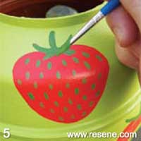 Step 5 how to plant and water a strawberry planter