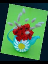 Make a daisy vase from an old teapot