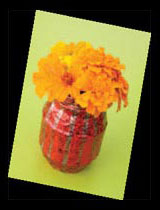 Paint a flower vase from an old jam jar