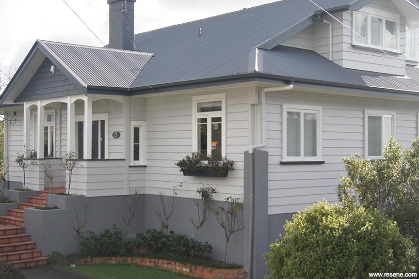 Renovated white and grey bungalow exterior