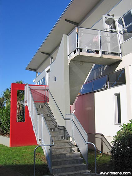 Red, grey, and white school exterior