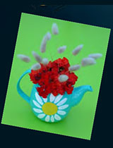 Paint a daisy vase from a ceramic teapot