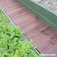 Build a boardwalk between two raised beds