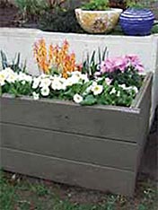 Create a simple raised bed using H4 tongue and groove timber and Resene Waterborne Woodsman penetrating oil stain.