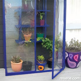Build a mini-greenhouse for vulnerable plants