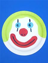 Paint a clown face from a paper plate