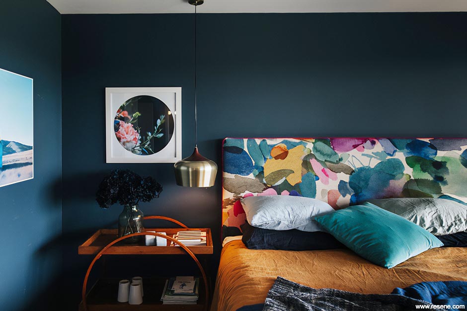 A dark blue bedroom in Resene Coast