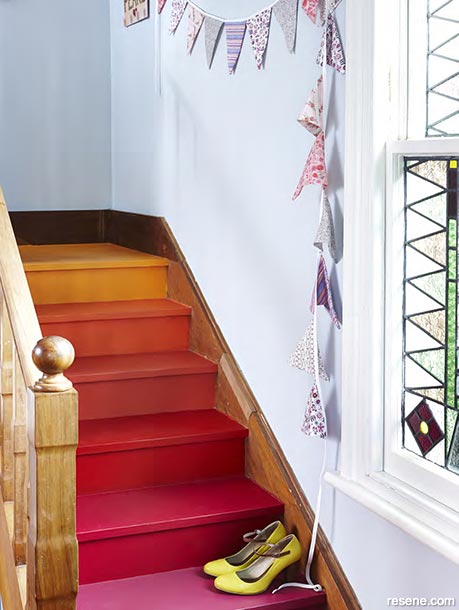 Colourful painted stairs with bunting