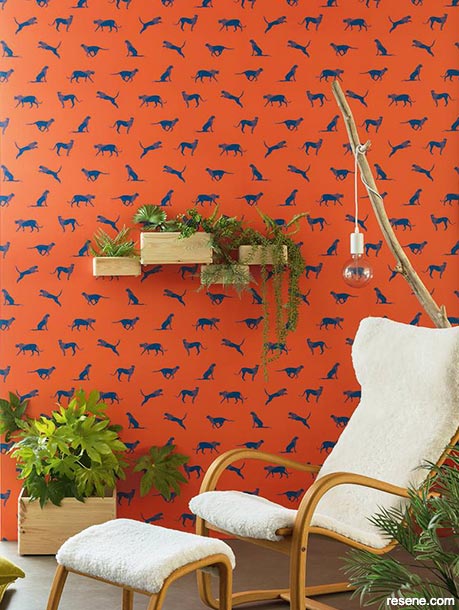 A sitting room with bold wallpaper