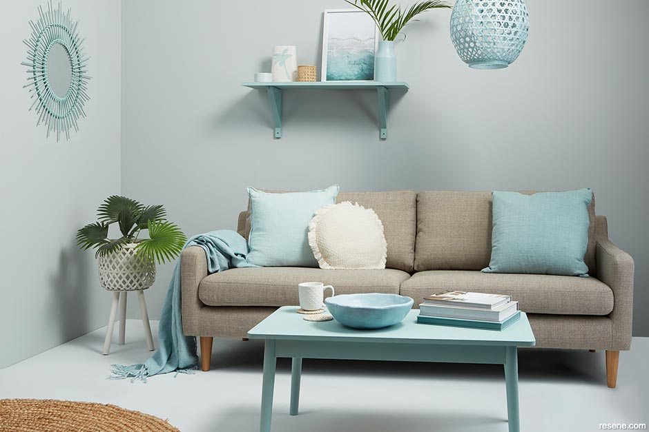 A warm and inviting duck egg blue lounge