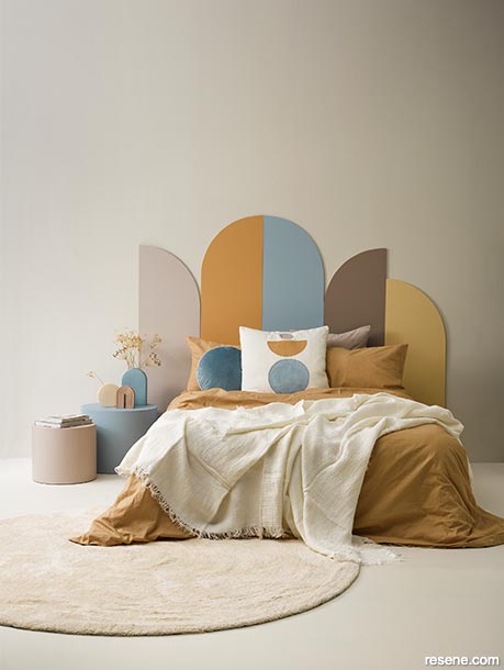 A painted curved headboard