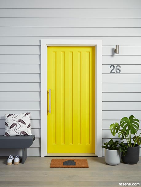 A cheerful yellow front door