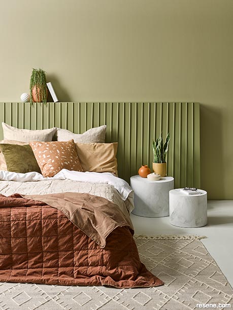 A cosy green bedroom