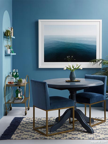 A sea blue dining room 