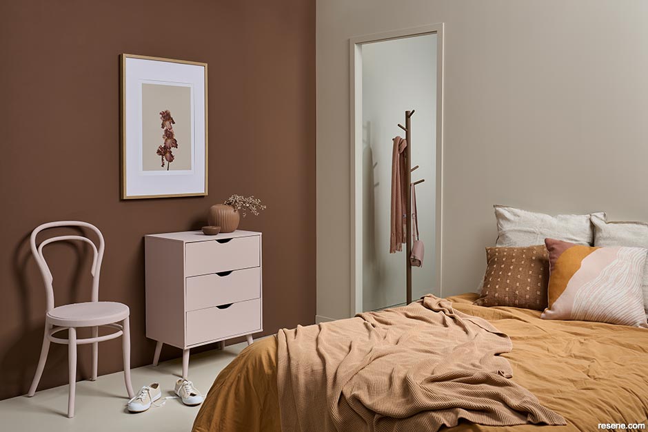 A bedroom painted with muted desert hues