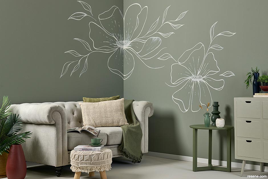 A botanical green lounge with a delicate floral line drawing