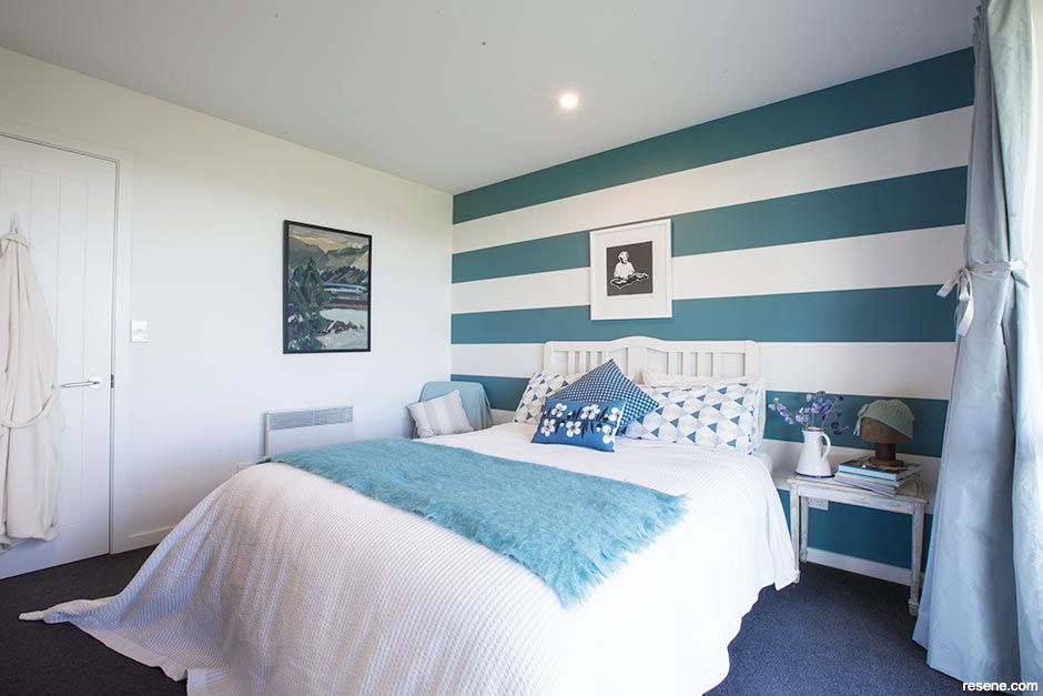 A blue striped bedroom