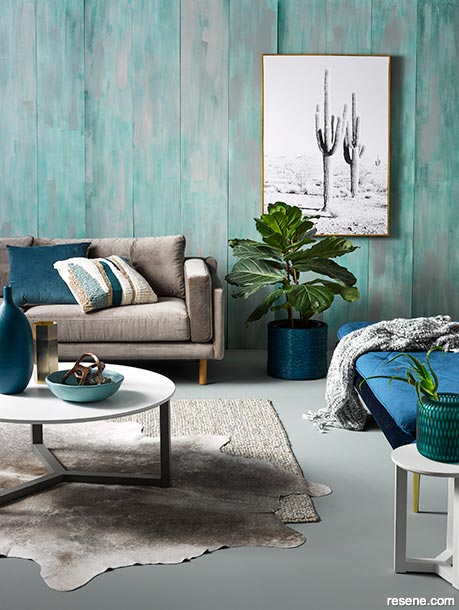A sea green and teal living room