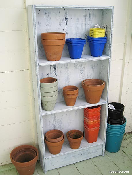 Build a rustic shelving unit for your garden pots