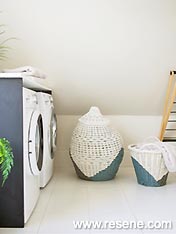 Paint cane and wicker laundry basket