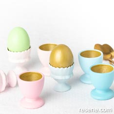 Painted Easter eggs and cups