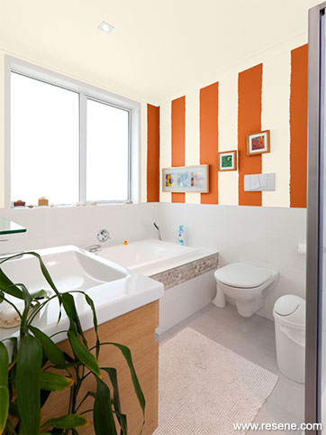 Bright happy and playfull orange pop in the  bathroom