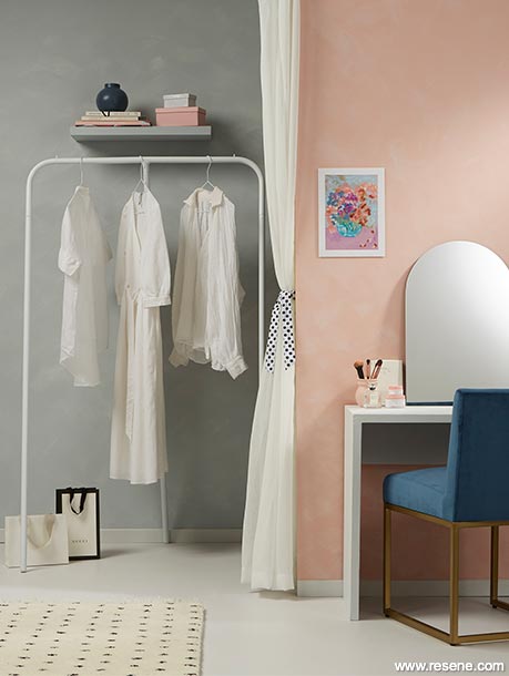 A pink and grey open wardrobe