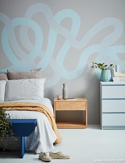 Blue wavy bedroom wall feature.
