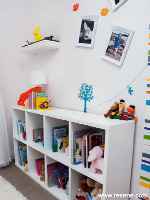 A colourful kid's room with stencilled art
