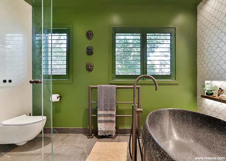A bold dramatic green bathroom in Resene Clover