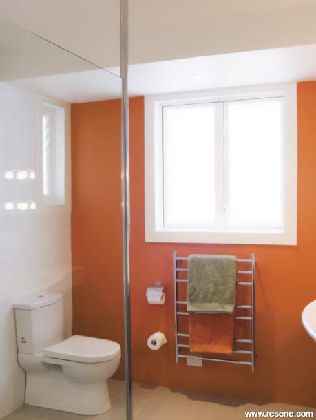 Orange and white bathroom