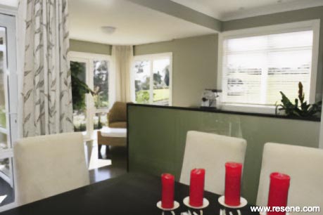 Green kitchen and dining room