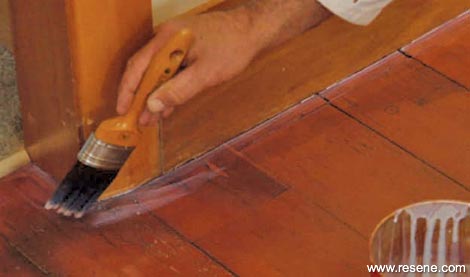 Cutting in the polyurethane around the corners of the timber floor