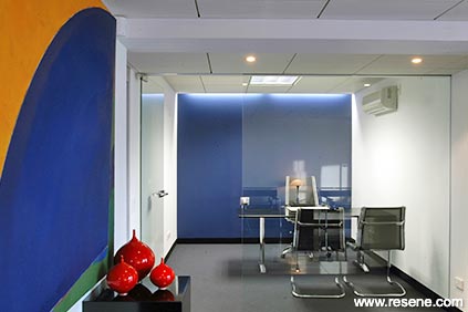 Blue, orange, and white office interior