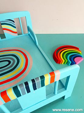 Paint an rainbow inspired dolls bed