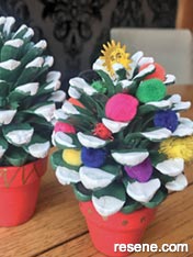 Paint christmas themed pinecone trees
