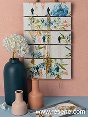 Wallpapered wall hanging, painted vases and trinket trays