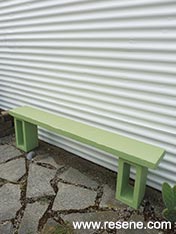 Paint a corrugated iron fence