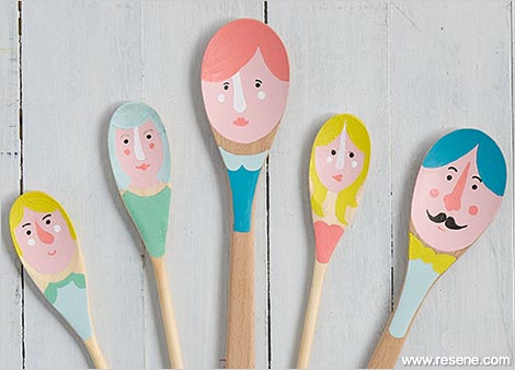 Paint family faces on wooden spoons